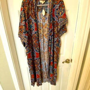 Beautiful kimono size 2 XL-3XL. Made by Oddy, new with tags.  .
